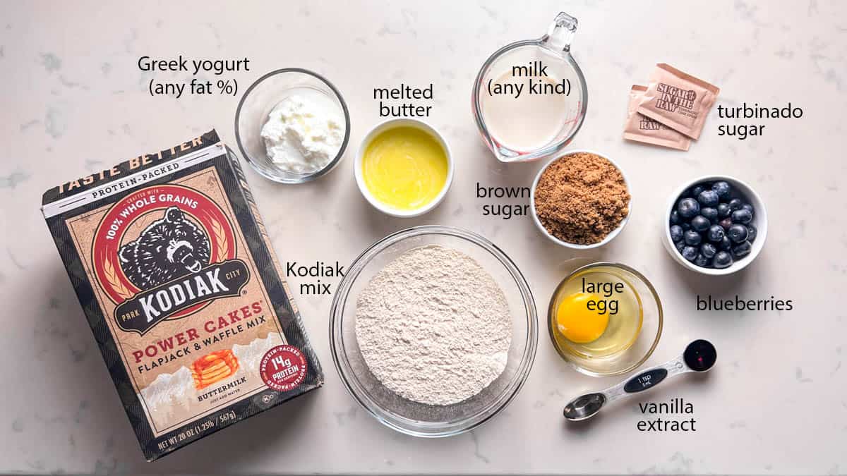 labeled photo of ingredients for Kodiak cakes blueberry muffins.