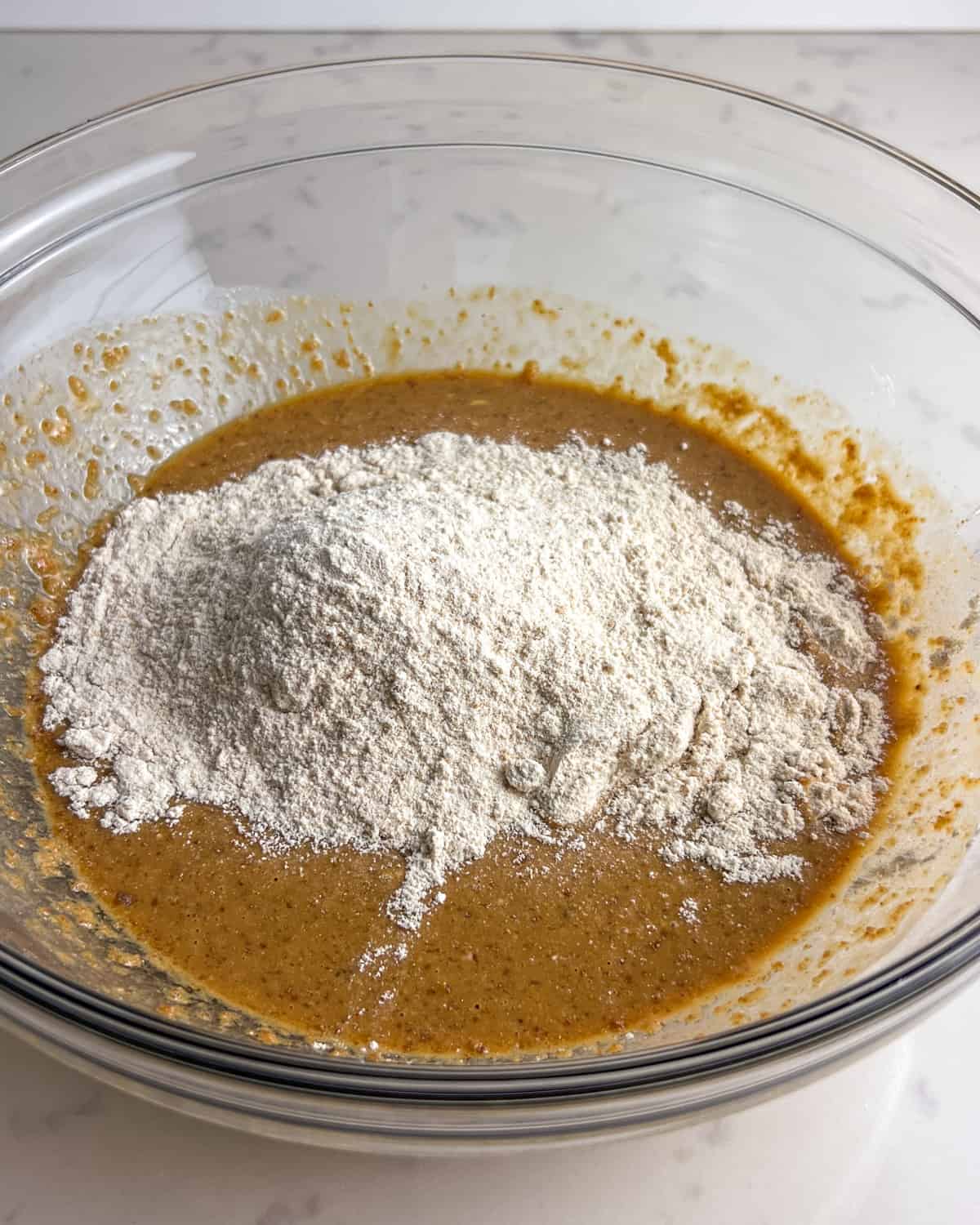 Kodiak mix added to wet ingredients in mixing bowl.