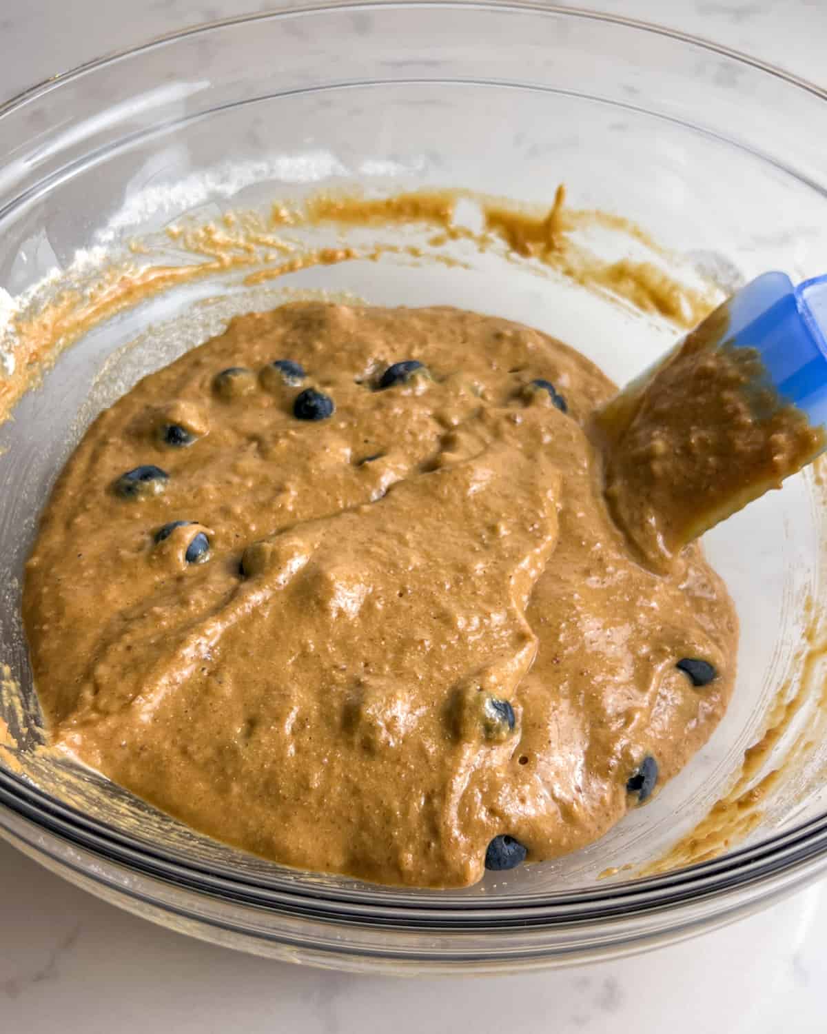 muffin batter after adding blueberries.